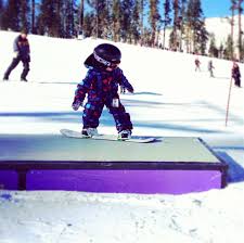 Kid. Snowboarding. Box. Slide. Shredding. Child. Little. Learning. Teaching. Park. Snowpark. Downhill